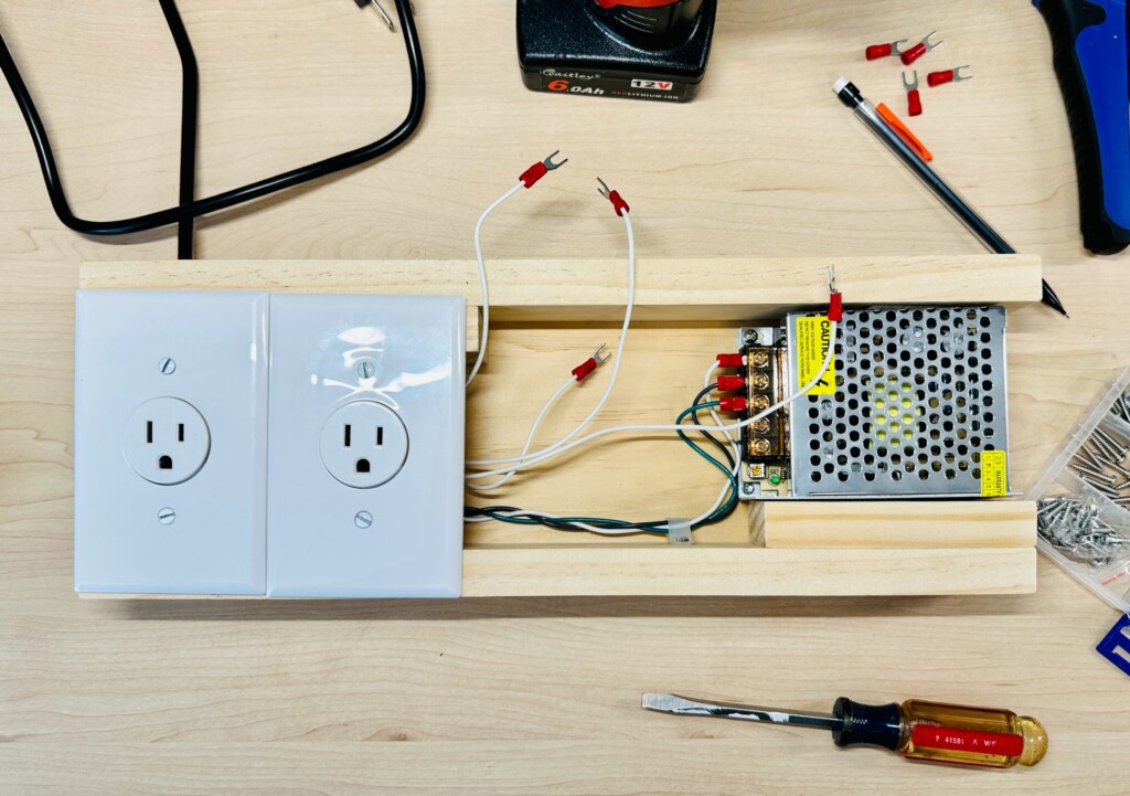 120V Sockets with Wall Plates Mounted Together
