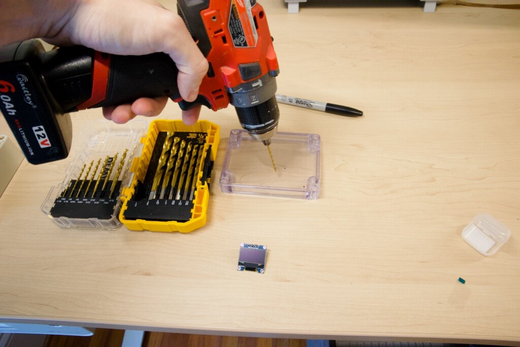 Drilling holes for mounting OLED to case